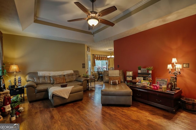 55 Ashton Pl, Covington, GA 30016 - living area with a raised ceiling, wood finished floors, and a ceiling fan
