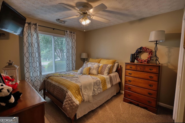 55 Ashton Pl, Covington, GA 30016 - bedroom featuring light carpet, a ceiling fan, and a textured ceiling