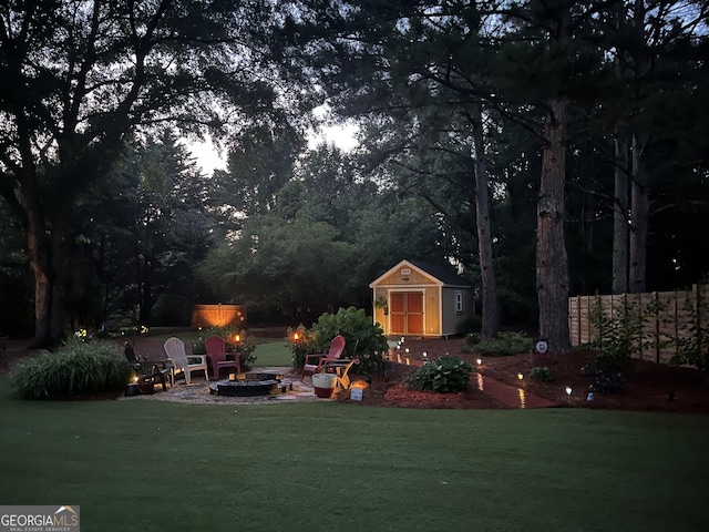 55 Ashton Pl, Covington, GA 30016 - view of grassy yard featuring a fire pit