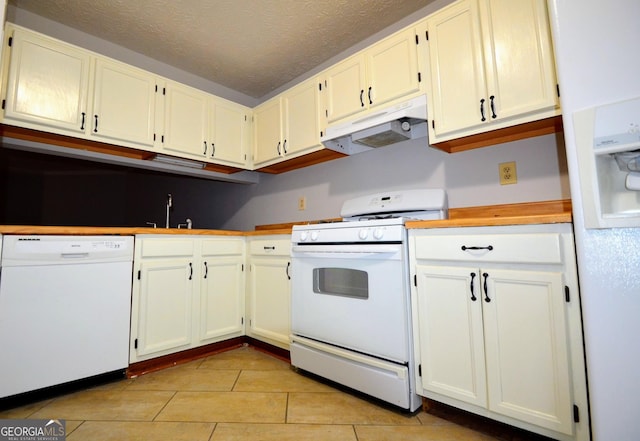 775 Heritage Valley Rd, Norcross, GA 30093 - kitchen with white appliances, under cabinet range hood, a textured ceiling, a sink, and white cabinetry