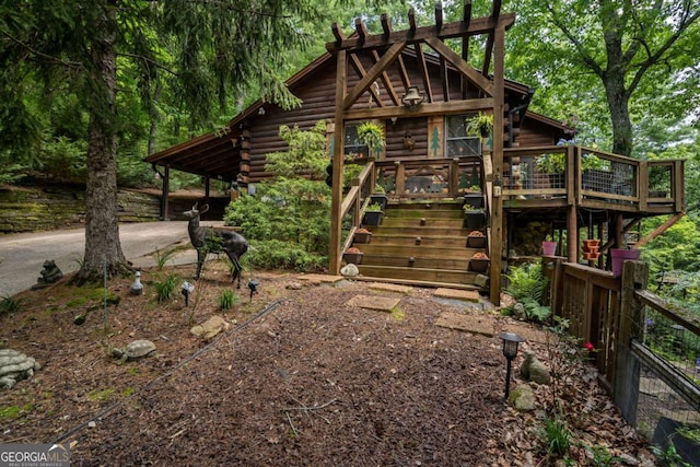371 Little Rock Creek Ct, Cherry Log, GA 30522 - cabin featuring log siding, stairs, and a wooden deck