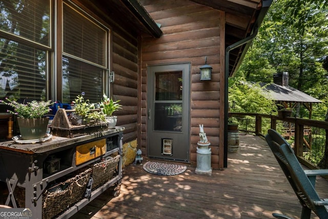 371 Little Rock Creek Ct, Cherry Log, GA 30522 - view of exterior entry featuring a deck and faux log siding