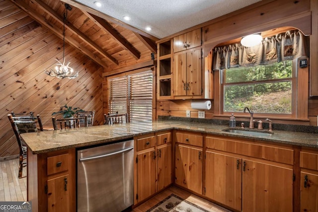 371 Little Rock Creek Ct, Cherry Log, GA 30522 - kitchen with stainless steel dishwasher, a sink, a peninsula, wooden walls, and light wood-style flooring