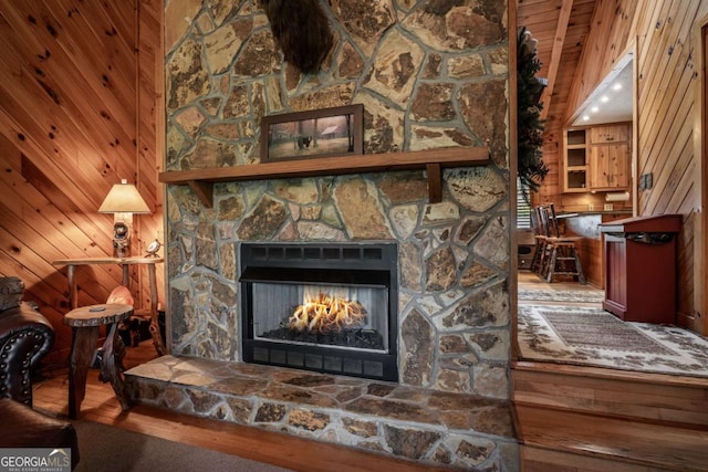 371 Little Rock Creek Ct, Cherry Log, GA 30522 - detailed view of wood finished floors, a fireplace, and wooden walls