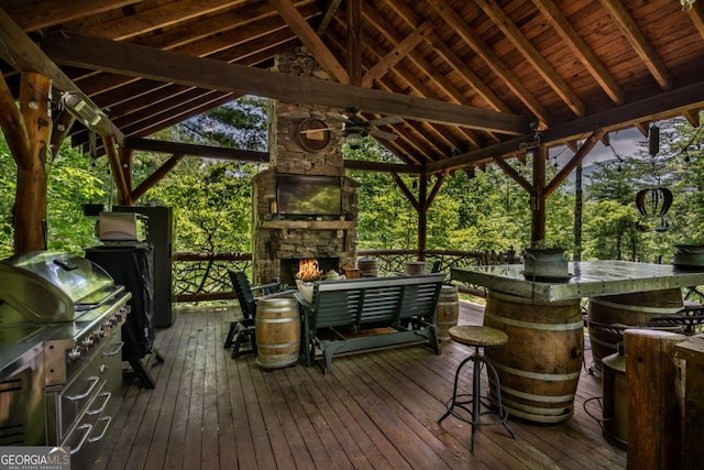 371 Little Rock Creek Ct, Cherry Log, GA 30522 - wooden terrace featuring a gazebo, an outdoor stone fireplace, and area for grilling