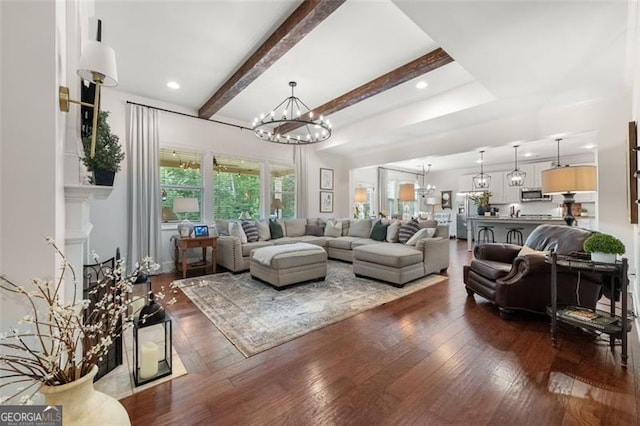 2680 Augeron Ct, Alpharetta, GA 30004 - living area with a chandelier, wood-type flooring, and beamed ceiling