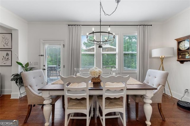 2680 Augeron Ct, Alpharetta, GA 30004 - dining space featuring a chandelier, wood finished floors, and crown molding