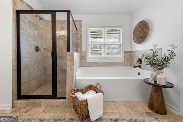 2680 Augeron Ct, Alpharetta, GA 30004 - bathroom featuring a bath and a stall shower