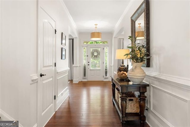 2680 Augeron Ct, Alpharetta, GA 30004 - foyer entrance featuring ornamental molding, a decorative wall, dark wood-style floors, and wainscoting