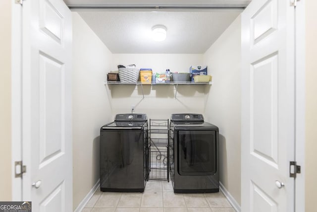 76 Duke Ln, Kathleen, GA 31047 - washroom featuring washer and dryer, light tile patterned floors, and a textured ceiling