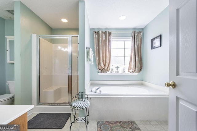 76 Duke Ln, Kathleen, GA 31047 - bathroom with a bath, a shower stall, vanity, recessed lighting, and tile patterned flooring
