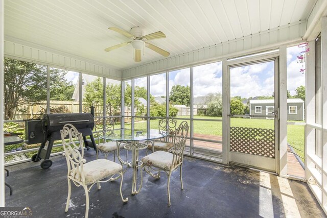 76 Duke Ln, Kathleen, GA 31047 - sunroom featuring a ceiling fan and outdoor dining area