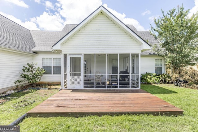 76 Duke Ln, Kathleen, GA 31047 - back of house with a sunroom, a shingled roof, a yard, and a deck