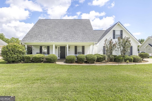 76 Duke Ln, Kathleen, GA 31047 - view of front of home featuring a front lawn, a shingled roof, and a porch