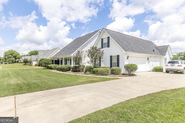 76 Duke Ln, Kathleen, GA 31047 - view of front of property with driveway, a front lawn, a shingled roof, and an attached garage