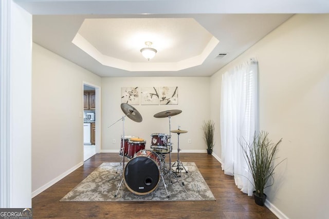 76 Duke Ln, Kathleen, GA 31047 - dining space with a raised ceiling and wood finished floors