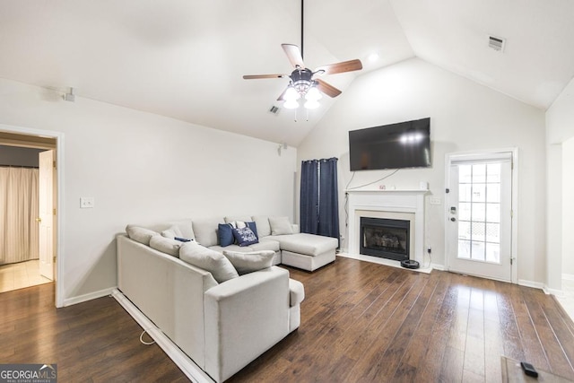 76 Duke Ln, Kathleen, GA 31047 - living room featuring a ceiling fan, dark wood finished floors, high vaulted ceiling, and a fireplace