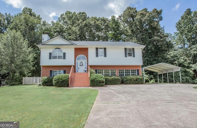 729 Almon Rd, Carrollton, GA 30117 - raised ranch with brick siding, driveway, a chimney, a carport, and stairs