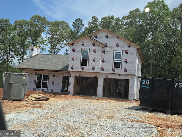 92 Armstrong Dr Unit 87, Mansfield, GA 30055 - unfinished property with a garage, driveway, and roof with shingles