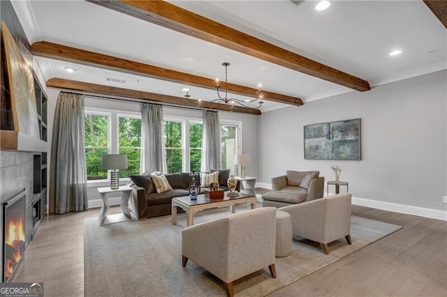6445 Lucent Ln, Atlanta, GA 30328 - living area featuring baseboards, healthy amount of natural light, light wood-type flooring, a fireplace, and beamed ceiling