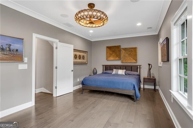 6445 Lucent Ln, Atlanta, GA 30328 - bedroom featuring wood finished floors, crown molding, baseboards, and recessed lighting