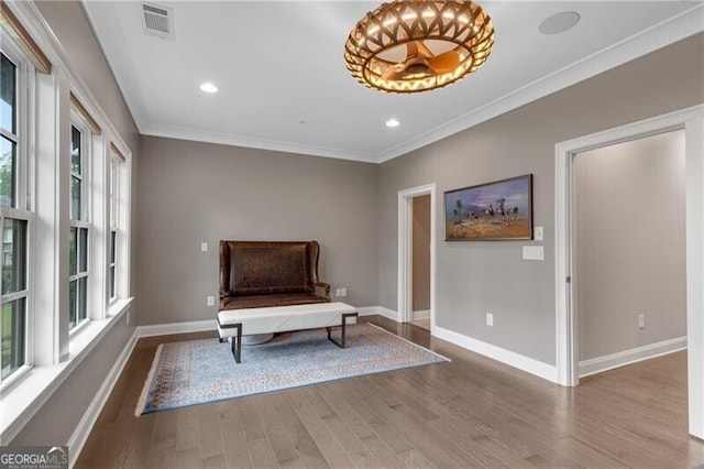 6445 Lucent Ln, Atlanta, GA 30328 - sitting room featuring plenty of natural light, wood finished floors, baseboards, crown molding, and recessed lighting