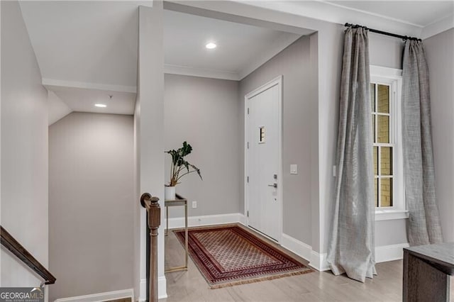 6445 Lucent Ln, Atlanta, GA 30328 - entrance foyer with wood finished floors, ornamental molding, baseboards, and recessed lighting