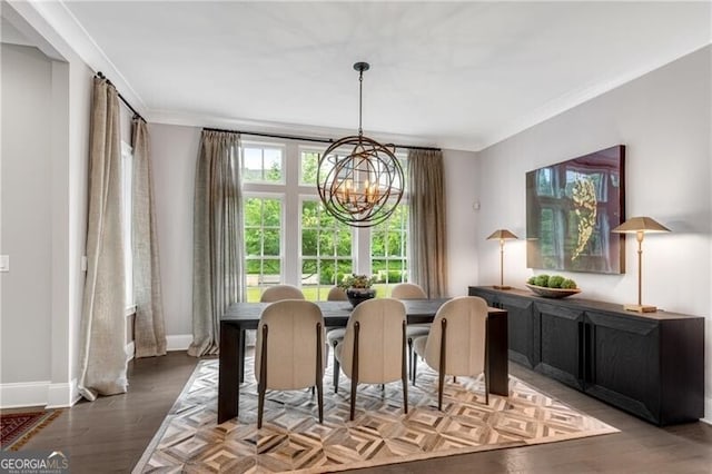 6445 Lucent Ln, Atlanta, GA 30328 - dining space featuring a chandelier, wood finished floors, baseboards, and ornamental molding