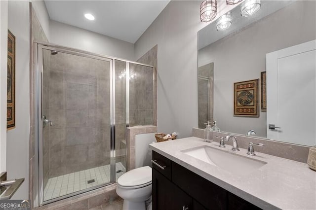 6445 Lucent Ln, Atlanta, GA 30328 - bathroom with vanity, toilet, and a shower stall