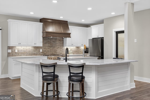 57 Clear Creek Valley Dr Unit 8A, Ellijay, GA 30536 - kitchen with premium range hood, freestanding refrigerator, baseboards, tasteful backsplash, and stove