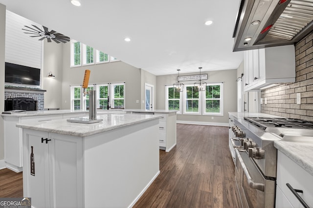 57 Clear Creek Valley Dr Unit 8A, Ellijay, GA 30536 - kitchen with a kitchen island, double oven range, exhaust hood, plenty of natural light, and recessed lighting