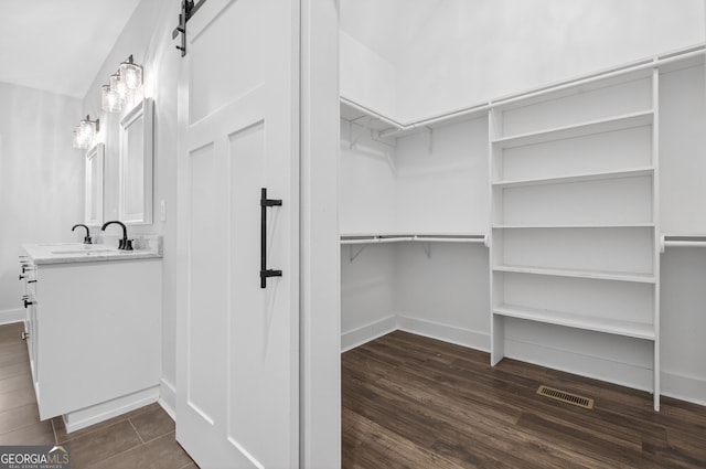 57 Clear Creek Valley Dr Unit 8A, Ellijay, GA 30536 - spacious closet with a sink and dark wood-type flooring