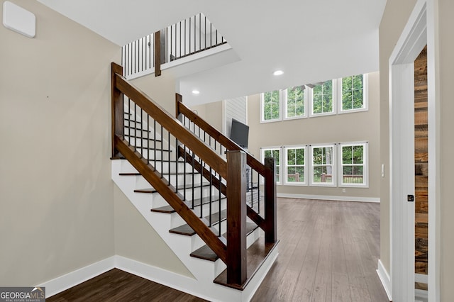 57 Clear Creek Valley Dr Unit 8A, Ellijay, GA 30536 - stairway with baseboards, plenty of natural light, recessed lighting, a towering ceiling, and wood finished floors