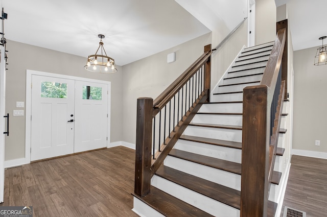 57 Clear Creek Valley Dr Unit 8A, Ellijay, GA 30536 - foyer featuring stairway, wood finished floors, a chandelier, and baseboards