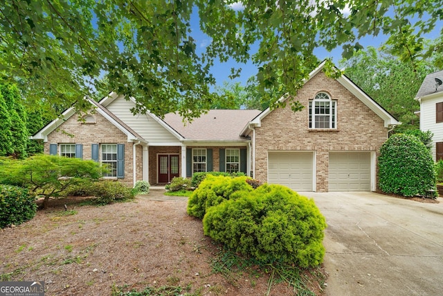 3633 Gilpin Ct, Lawren, GA 30044 - view of front facade featuring brick siding and concrete driveway