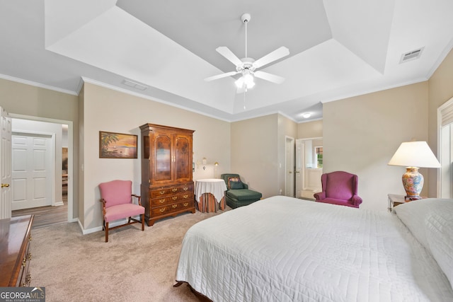 3633 Gilpin Ct, Lawren, GA 30044 - bedroom with a tray ceiling, light colored carpet, ornamental molding, baseboards, and ceiling fan