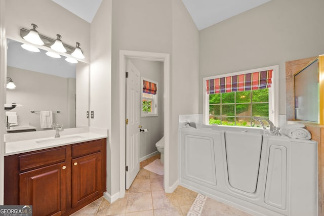 3633 Gilpin Ct, Lawren, GA 30044 - full bath featuring lofted ceiling, vanity, toilet, a bath, and tile patterned flooring
