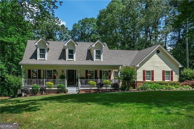 2050 Lyda Ln, Loganville, GA 30052 - new england style home with a front lawn and a porch