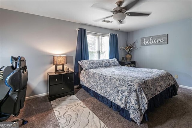 2050 Lyda Ln, Loganville, GA 30052 - carpeted bedroom featuring baseboards and a ceiling fan