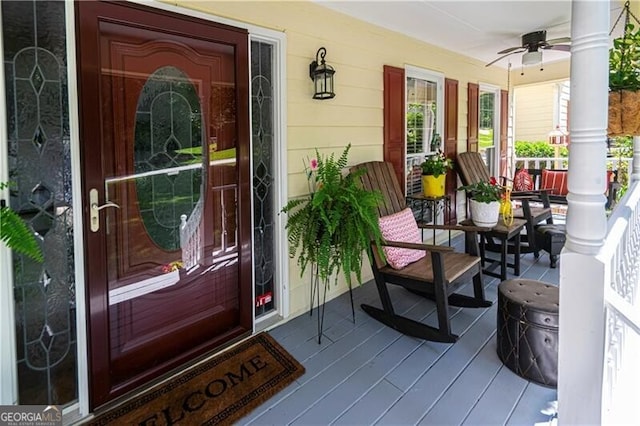 2050 Lyda Ln, Loganville, GA 30052 - doorway to property with covered porch and ceiling fan