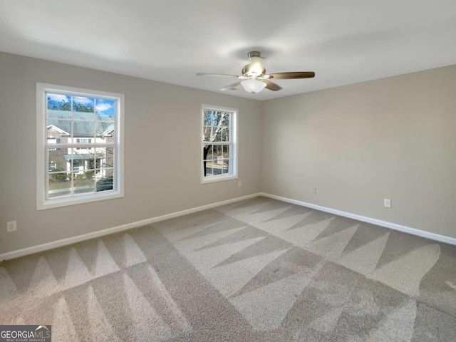 2555 Flat Shoals Rd Unit 3405, Atlanta, GA 30349 - carpeted spare room featuring ceiling fan and baseboards