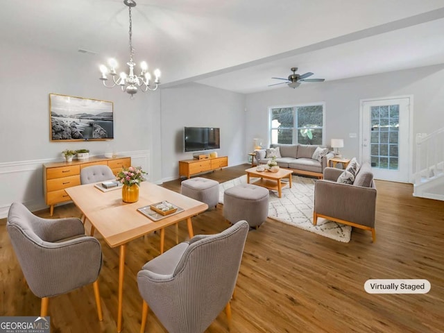 2555 Flat Shoals Rd Unit 3405, Atlanta, GA 30349 - dining space with a chandelier, light wood finished floors, a ceiling fan, and stairs