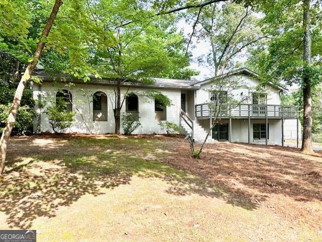 5384 Blackhawk Dr, Acworth, GA 30102 - view of front of home featuring a deck