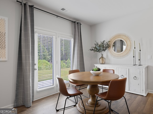 8215 Coldstream Dr, Fairburn, GA 30213 - dining space featuring wood finished floors and healthy amount of natural light