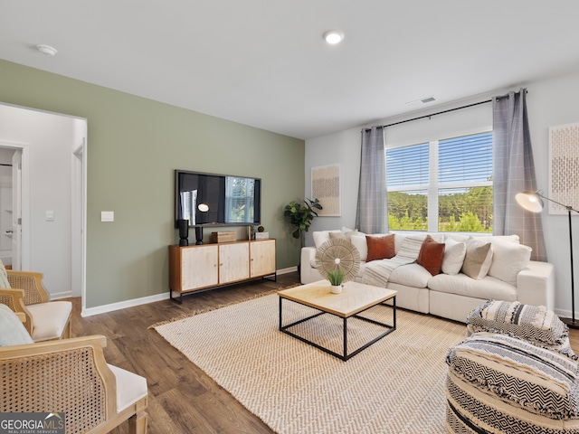 8215 Coldstream Dr, Fairburn, GA 30213 - living room featuring wood finished floors and baseboards