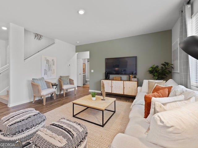 8215 Coldstream Dr, Fairburn, GA 30213 - living area featuring stairway, wood finished floors, and recessed lighting