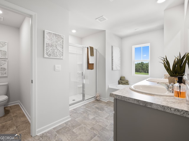 8215 Coldstream Dr, Fairburn, GA 30213 - bathroom with a stall shower, double vanity, and stone finish floors