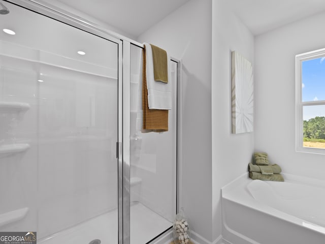8215 Coldstream Dr, Fairburn, GA 30213 - bathroom with a stall shower and a garden tub