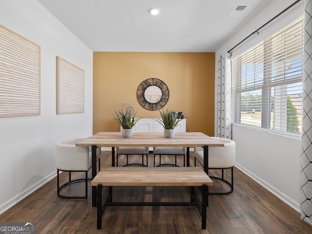 8215 Coldstream Dr, Fairburn, GA 30213 - dining room featuring baseboards and dark wood finished floors
