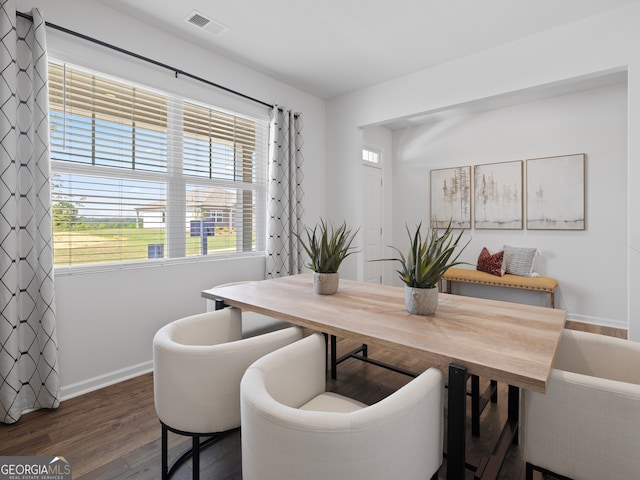 8215 Coldstream Dr, Fairburn, GA 30213 - dining room featuring dark wood finished floors and baseboards